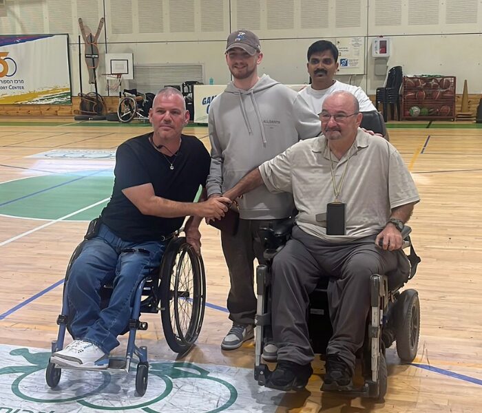 Bar Kupershtein with Boaz Kramer and his father at The Center